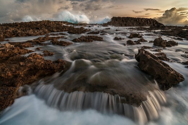 Rocks and stones in white foam