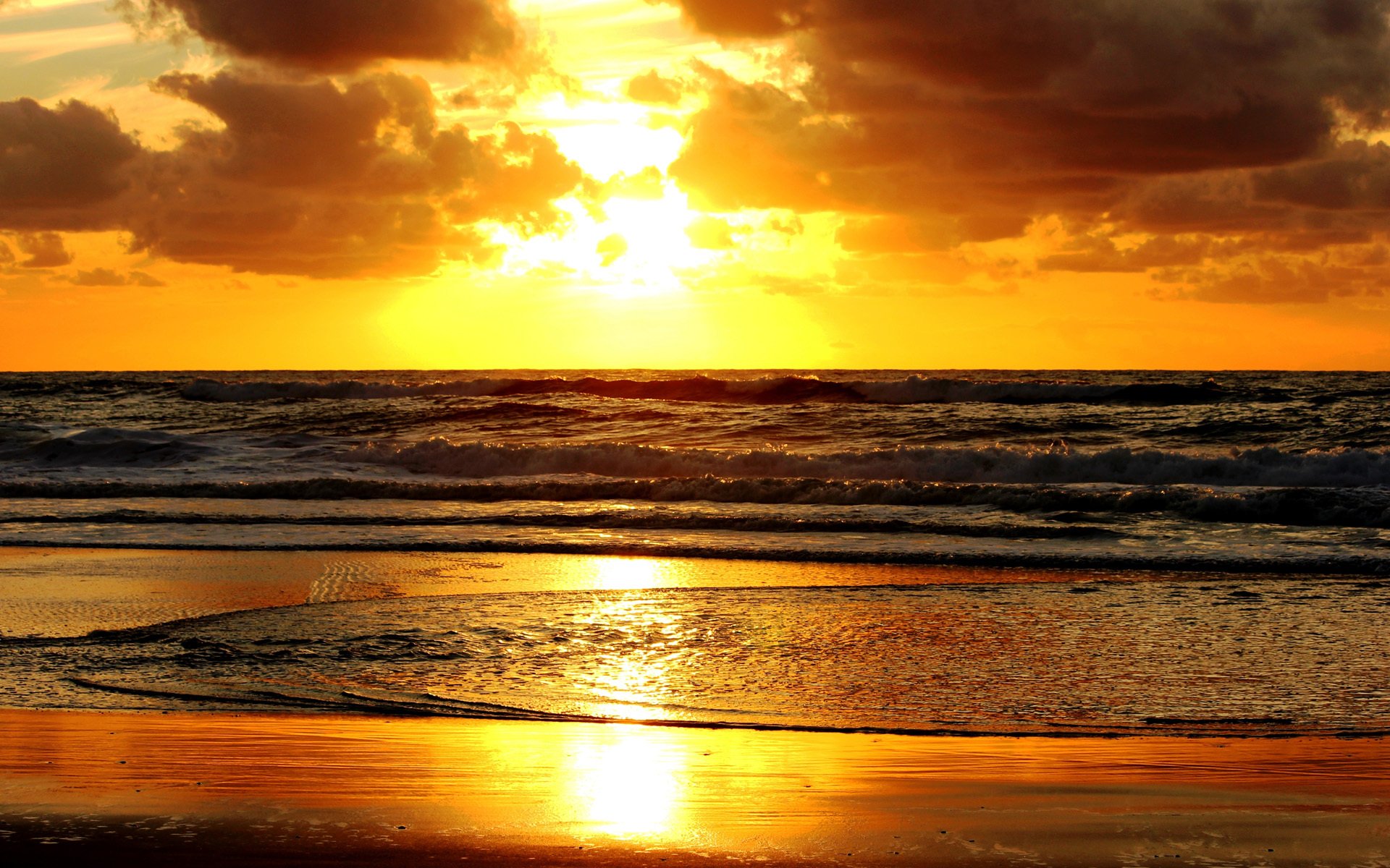 sonnenuntergang meer ufer sand wasser wellen wolken sonne