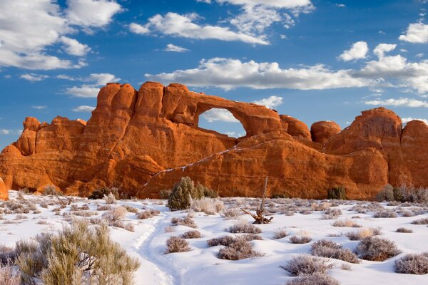 Orange rock with an arch in the middle