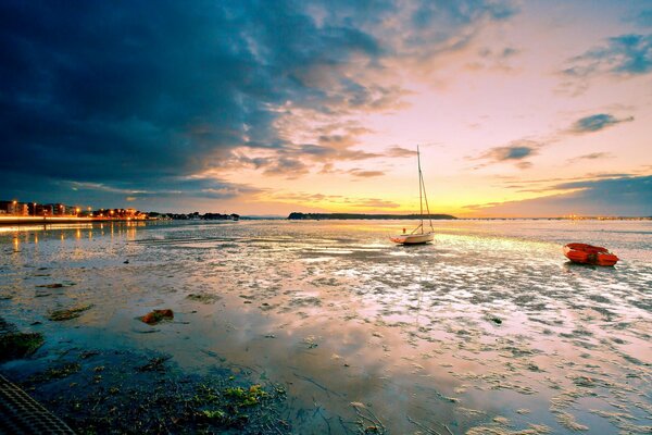 Boat in the river against the sky