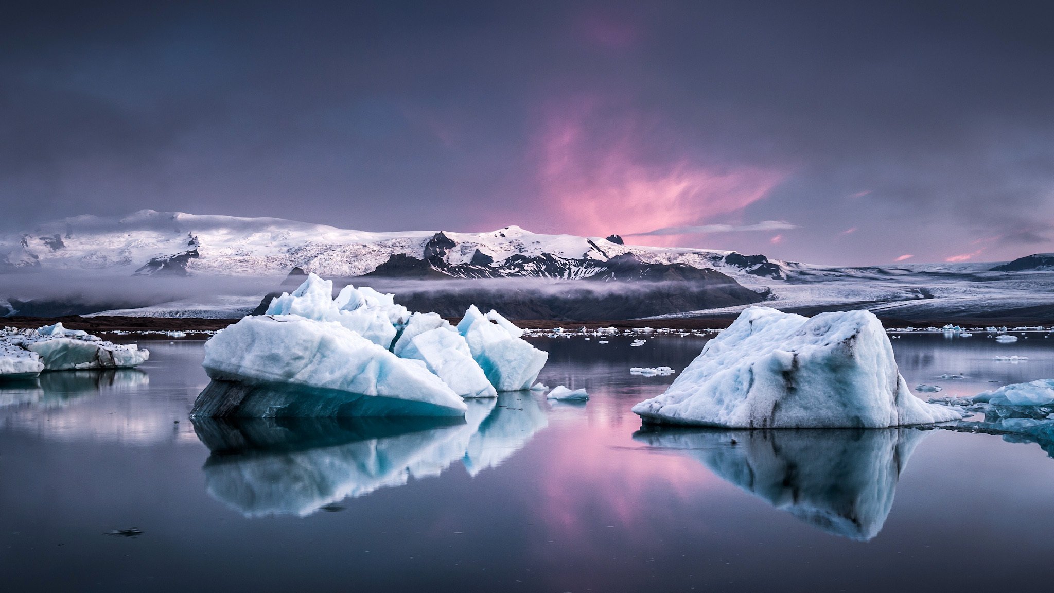 glace mer blocs roches neige nuages brouillard lueur