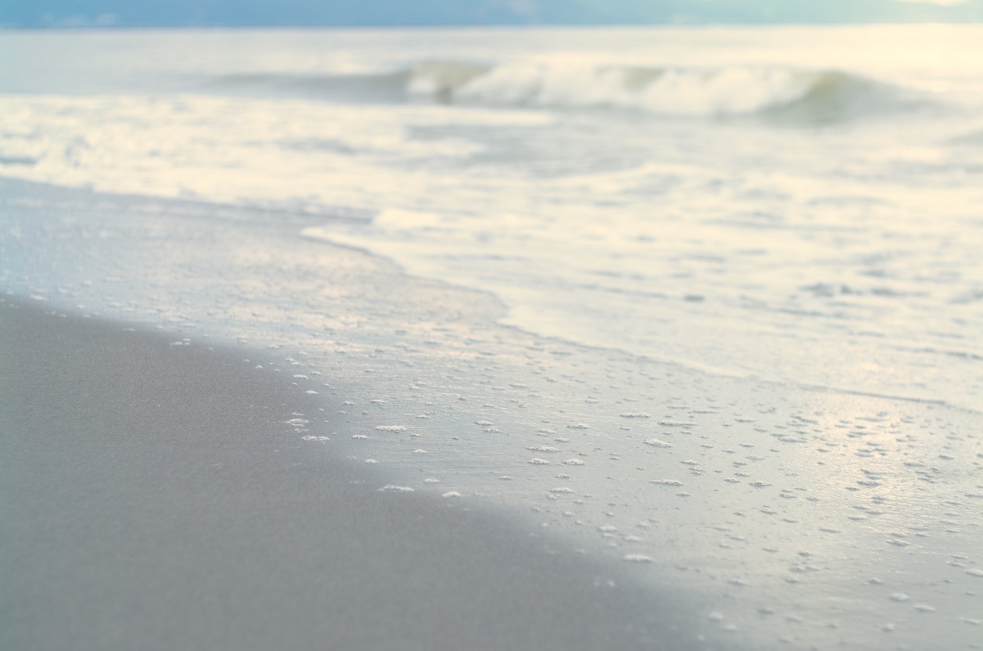 meer küste sand strand wellen welle wasser himmel ruhe natur