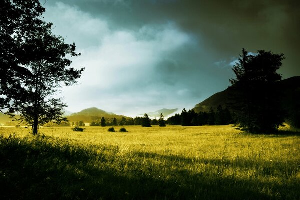 Morning dawn among fields and hills