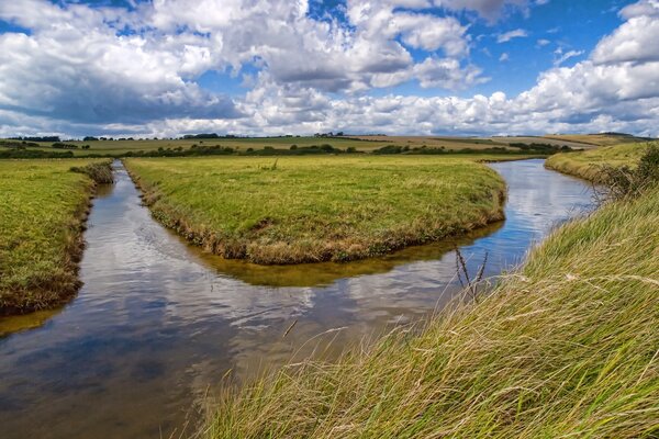 Sky with clouds over the mouth of the river