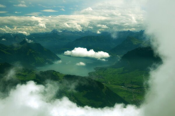 Lake among the green mountains from a height