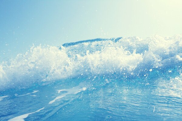 Onda di schiuma dell oceano blu