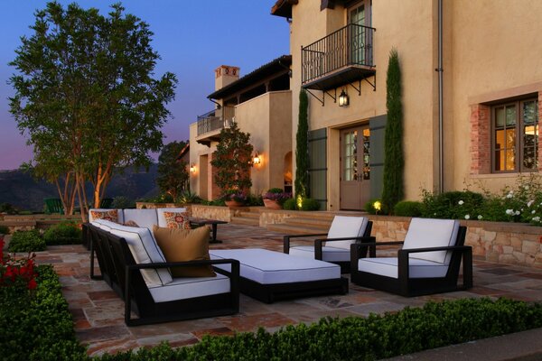 Villa at sunset with a beautiful courtyard