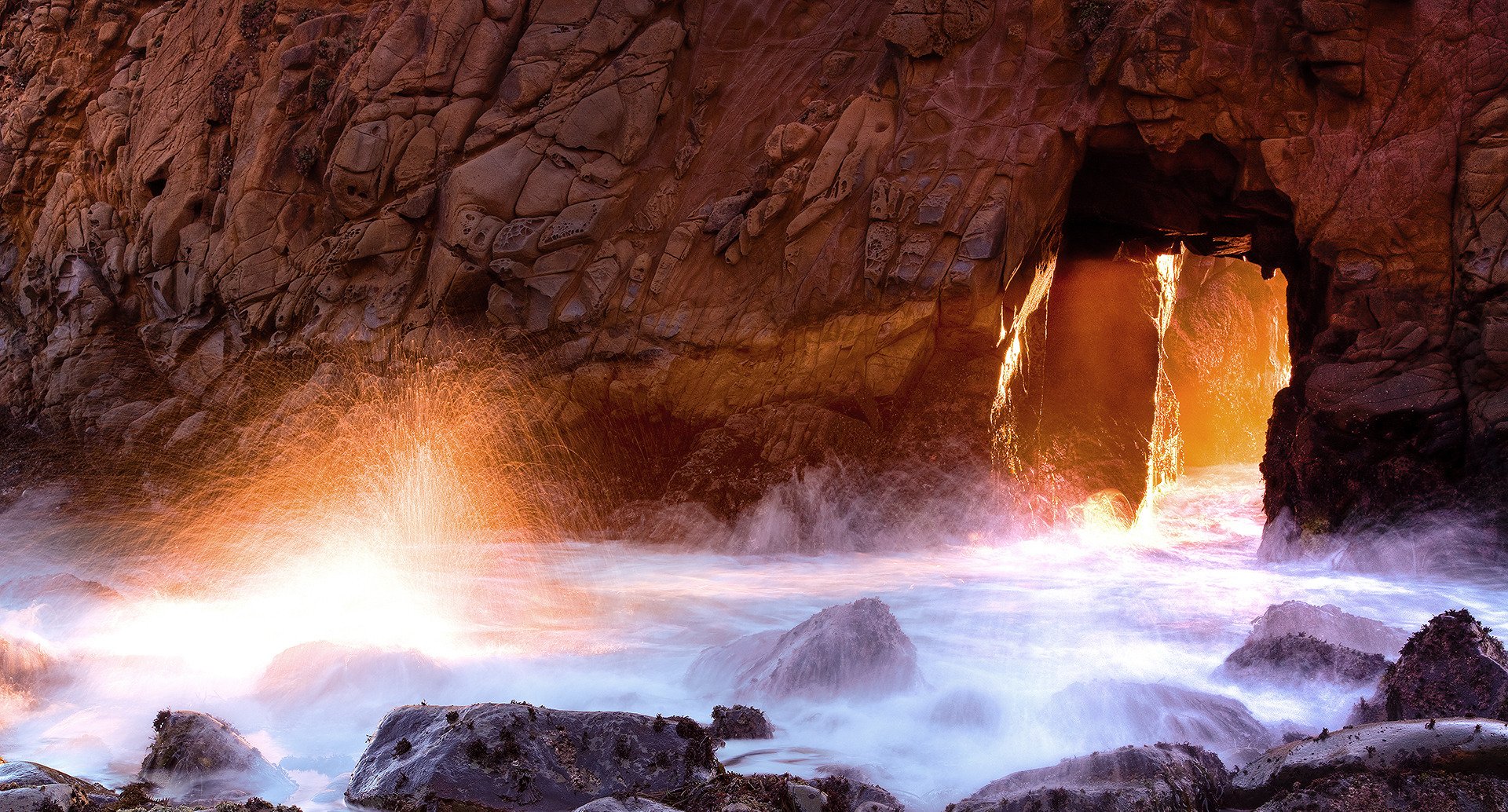 roches grottes éclaboussures eau océan mer arche lumière