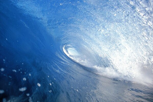 An image of an ocean wave from the inside