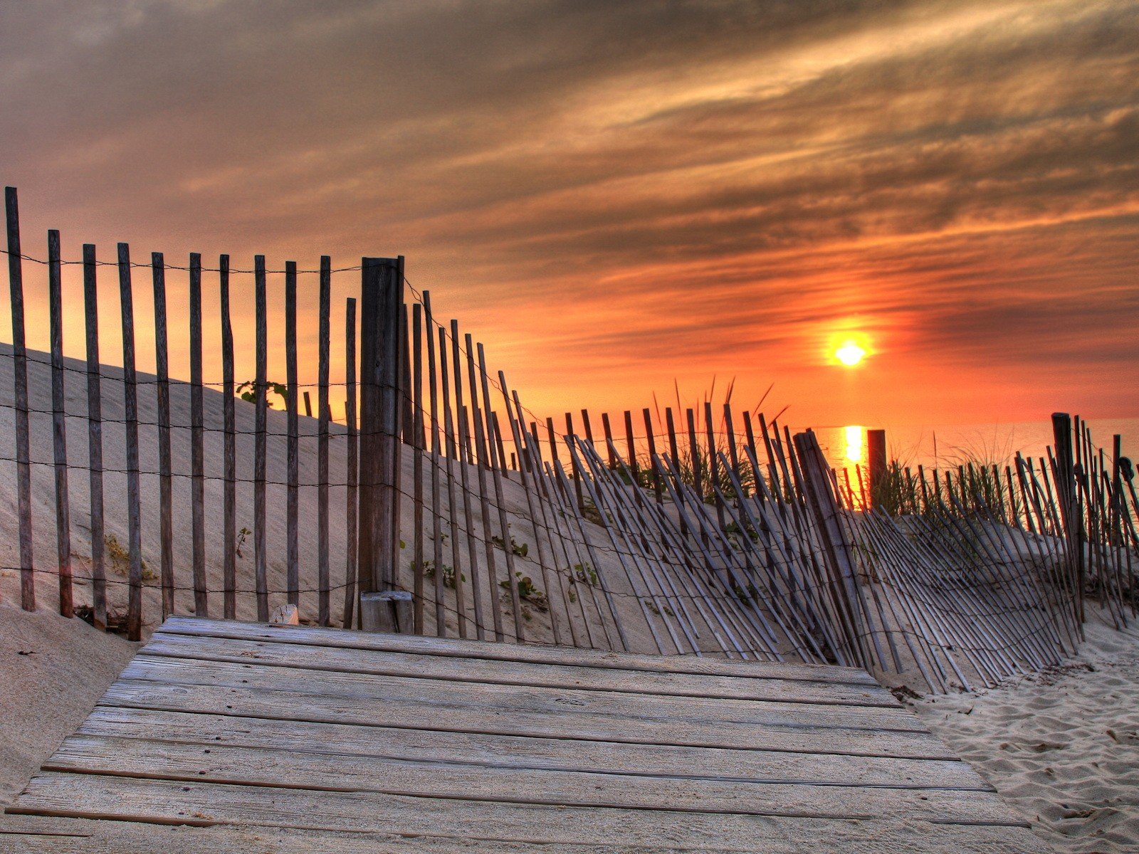 fence sand beach sun