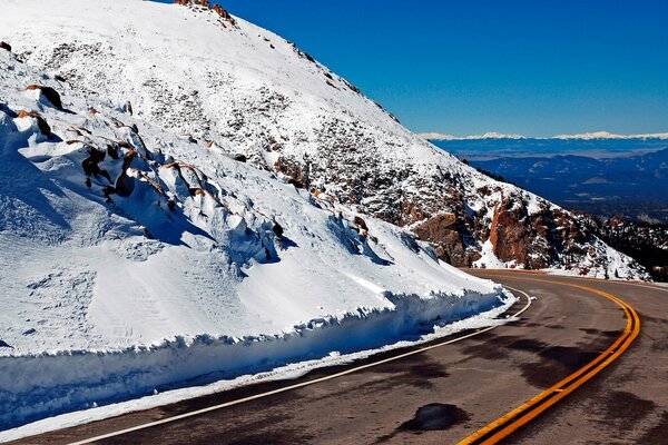 Turning the highway in a mountainous area in winter