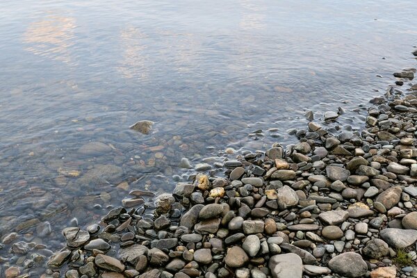 A stone shore made of pebbles is still a test