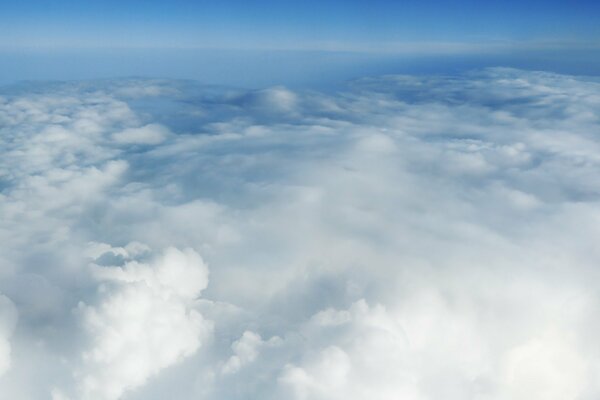 Flying above the clouds in the sky