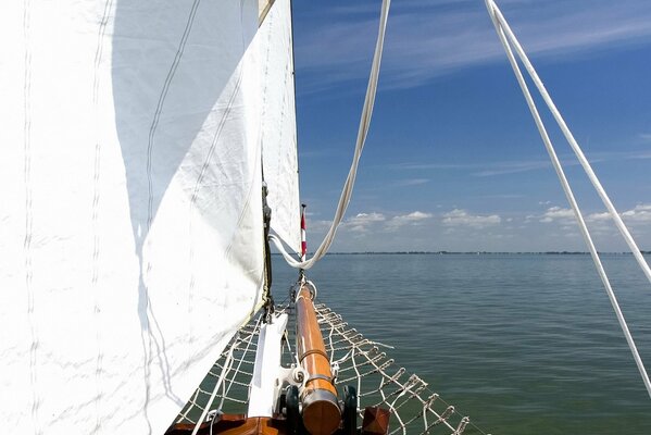 Sailing boat sailing in the quiet sea