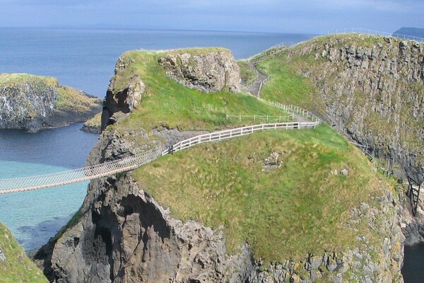 The bridge to the island passes over the ocean