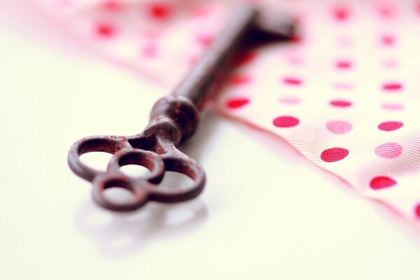 Macro photo of a vintage key on the table