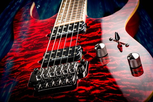 Macro photo of the red guitar