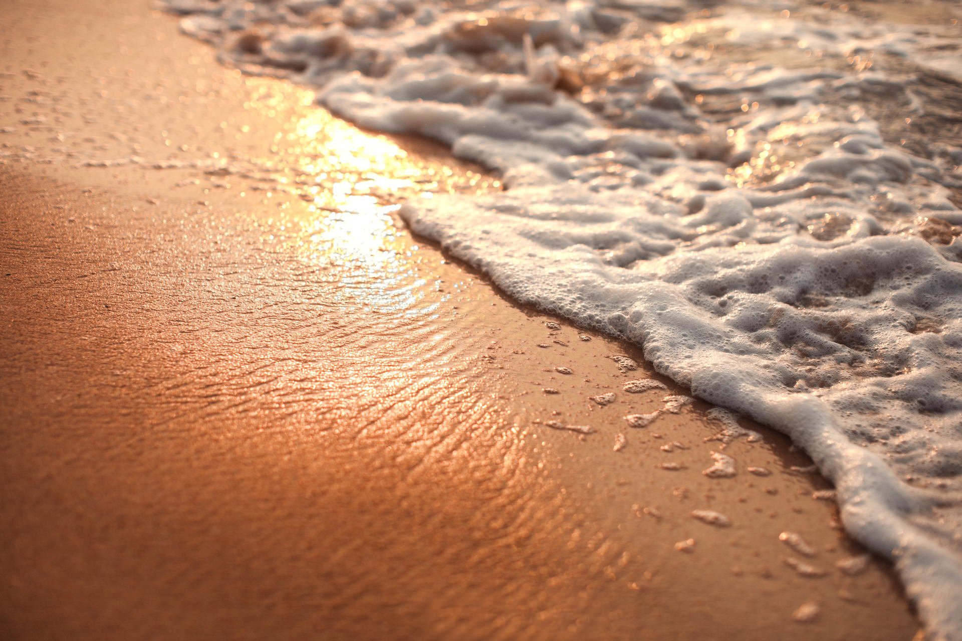 spiaggia sabbia schiuma