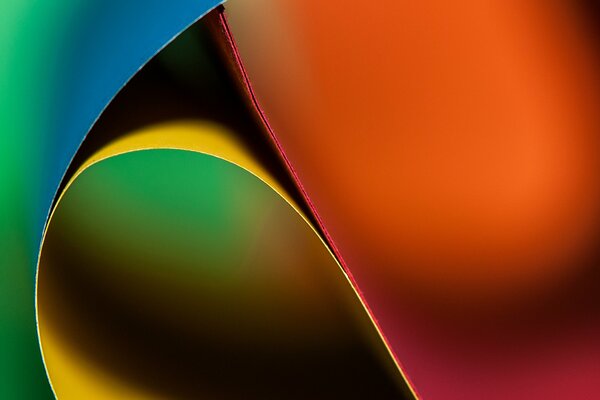 Macro shooting of the bending of multi-colored sheets