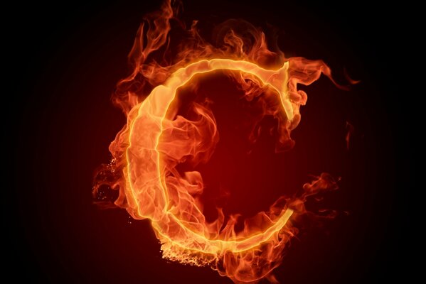 The letter C burning on a dark background