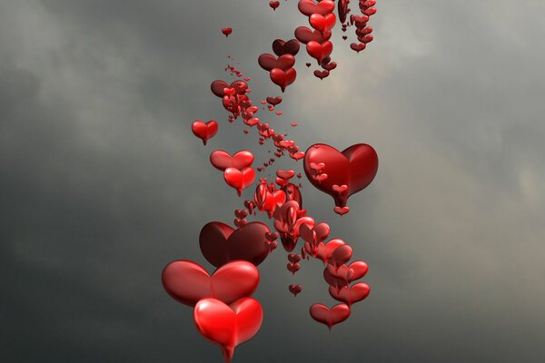 Muchos corazones sobre un fondo gris