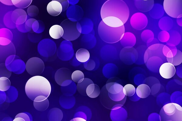 Riflessi di luce con cerchi di tonalità viola in combinazione con il blu