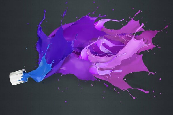 Splash de peinture de couleur sur fond noir