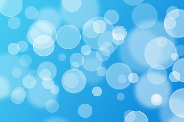 Abstract white bubbles on a blue background