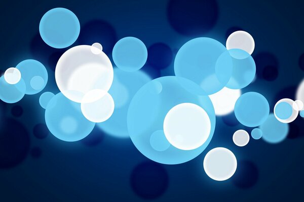 Blue and white circles on a dark background