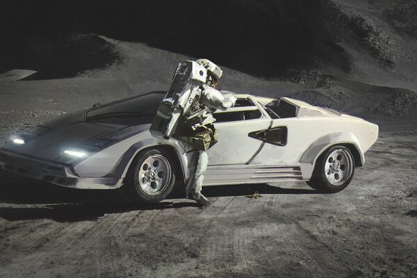 Lamborghini and an astronaut on the surface of the moon