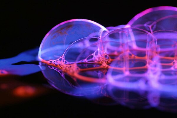 Colored bubbles on a dark background