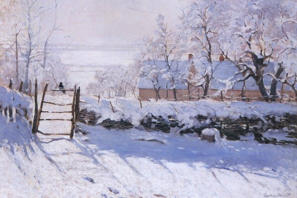 A crow on a winter snow-covered fence