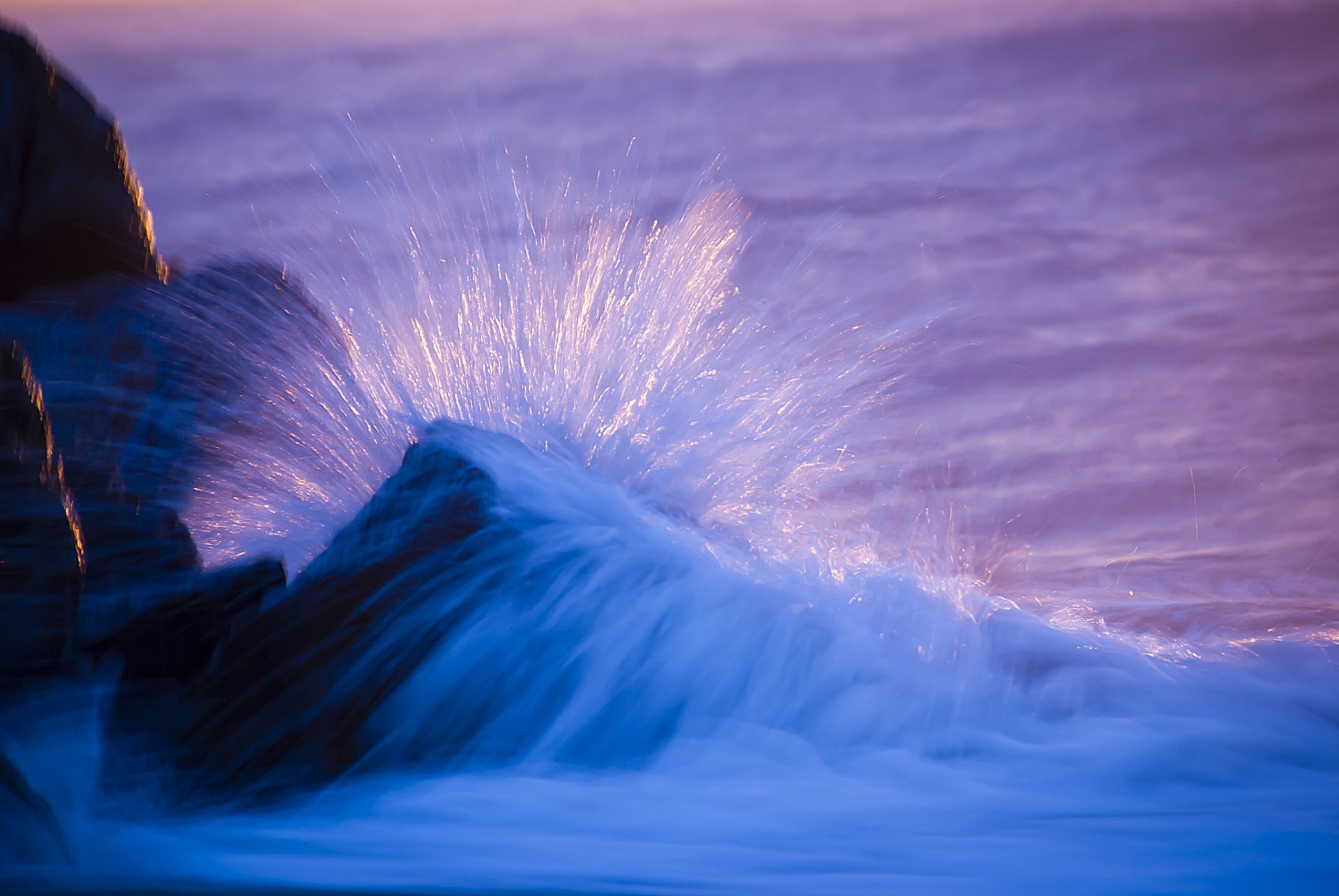 ea ocean beach stones waves wave spray close up