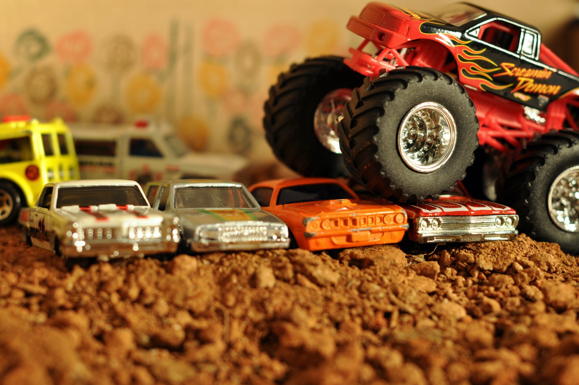 car auto car toy bigfoot bigfoot 4x4 pickup pickup overcomes obstacles old cars blur bokeh macro