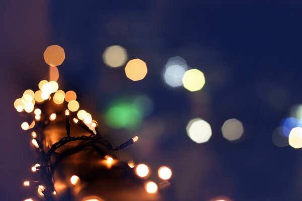 Blurred multicolored lights of the garland