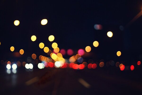 Bokeh of the night city street with cars