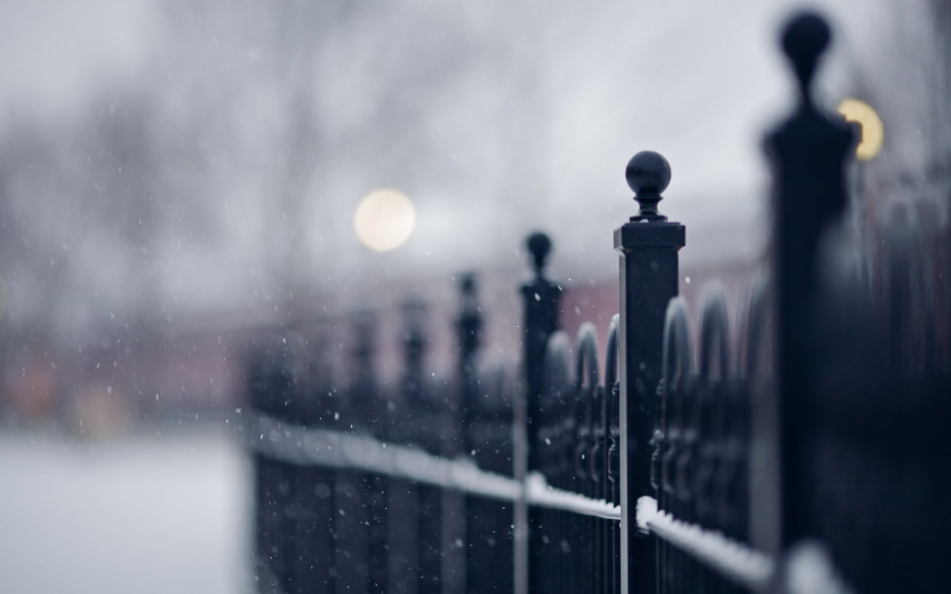 fence street snow close up