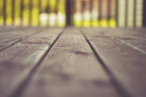 Wallpaper background, wooden boards in blur