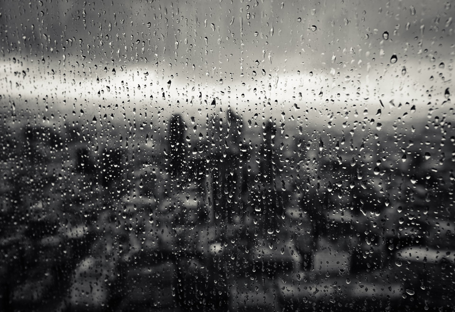 gouttes verre pluie fenêtre ville gros plan