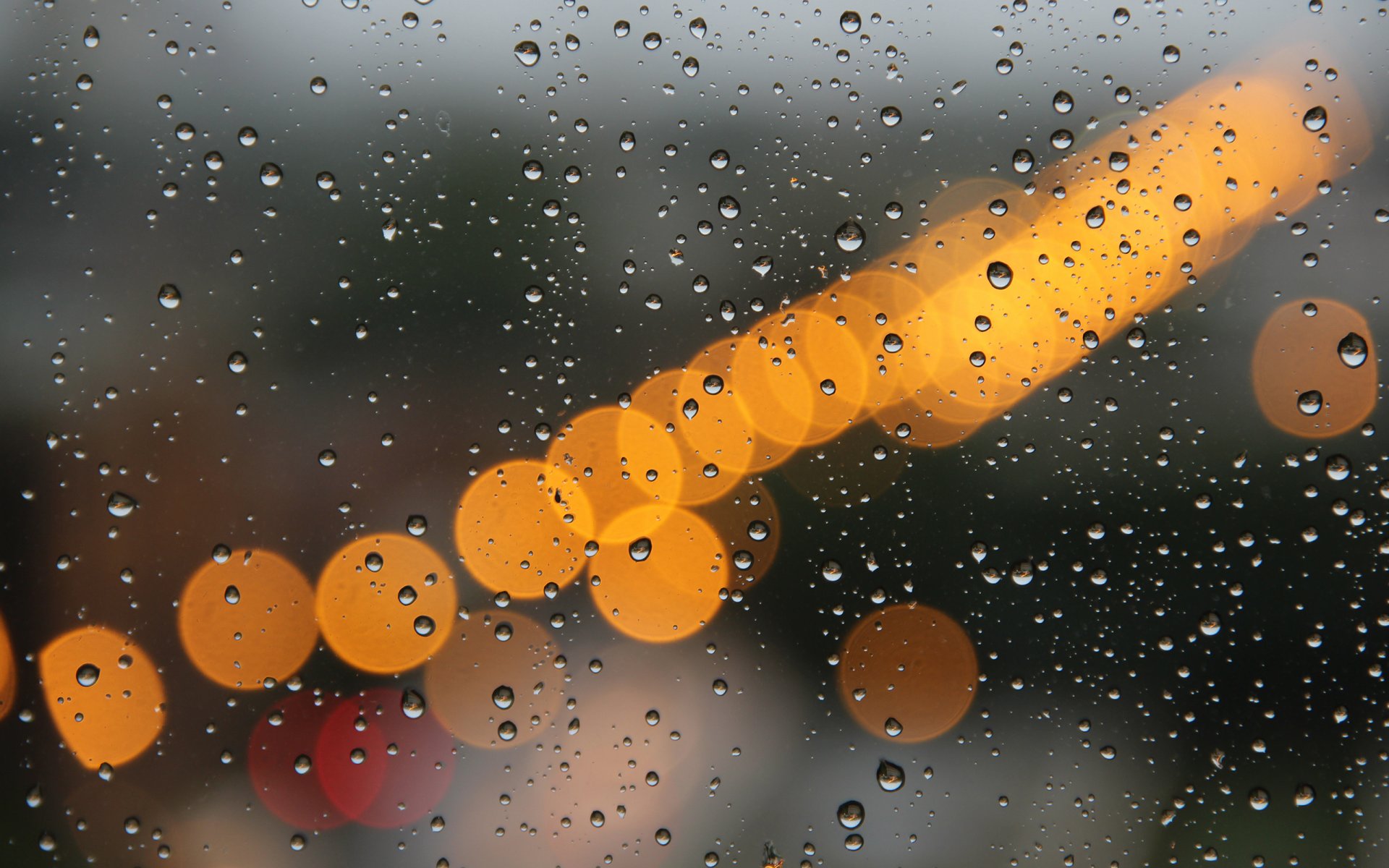 vidrio gotas luces lluvia macro