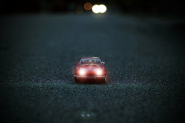 Toy cars on asphalt