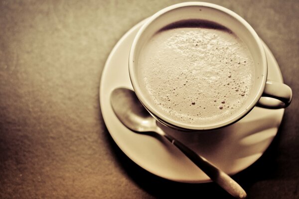 Coffee with foam in a cup