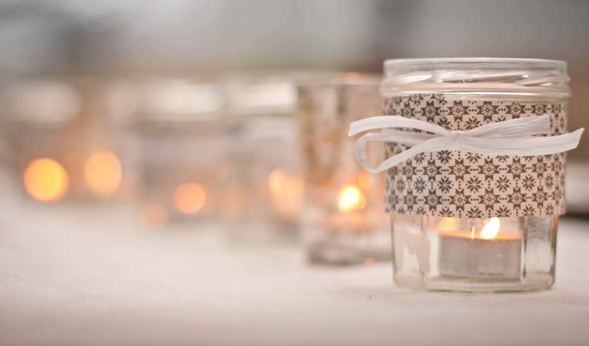 photo close up candles jars bokeh blur