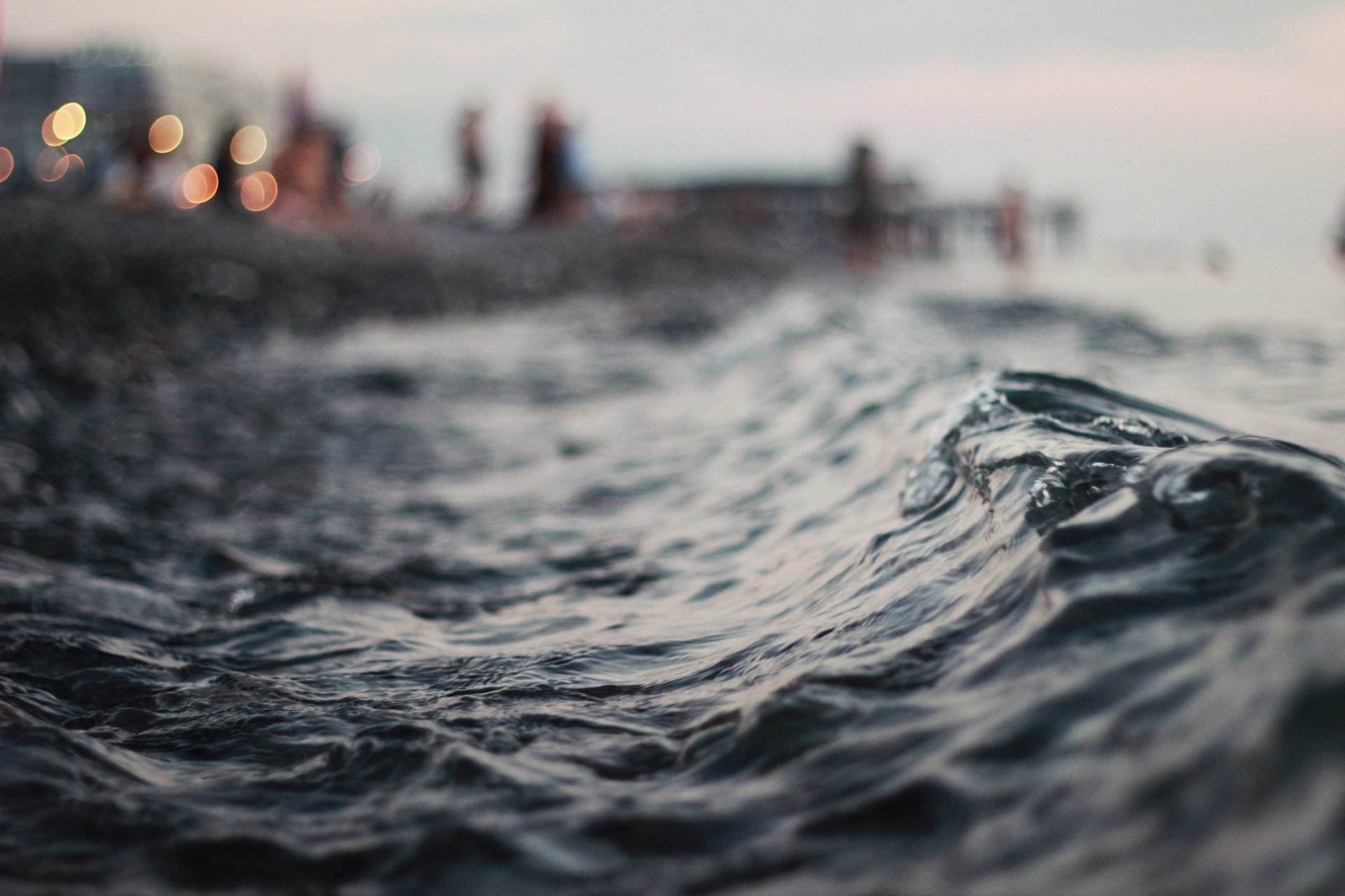 makro wasser wellen abend horizont lichter bokeh