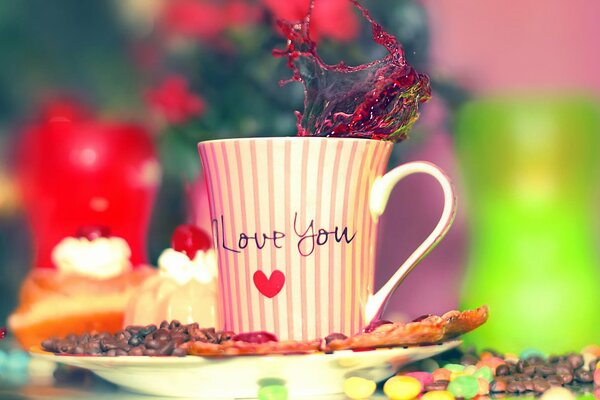 sweets with a cup with the inscription I love you 