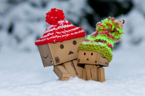 Little men from boxes in the snow