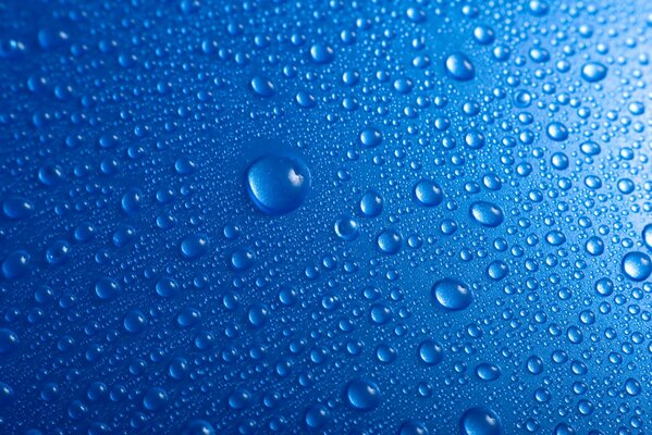 A drop of water on a blue background