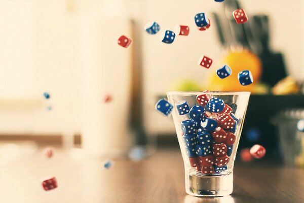 Dice in a glass cup