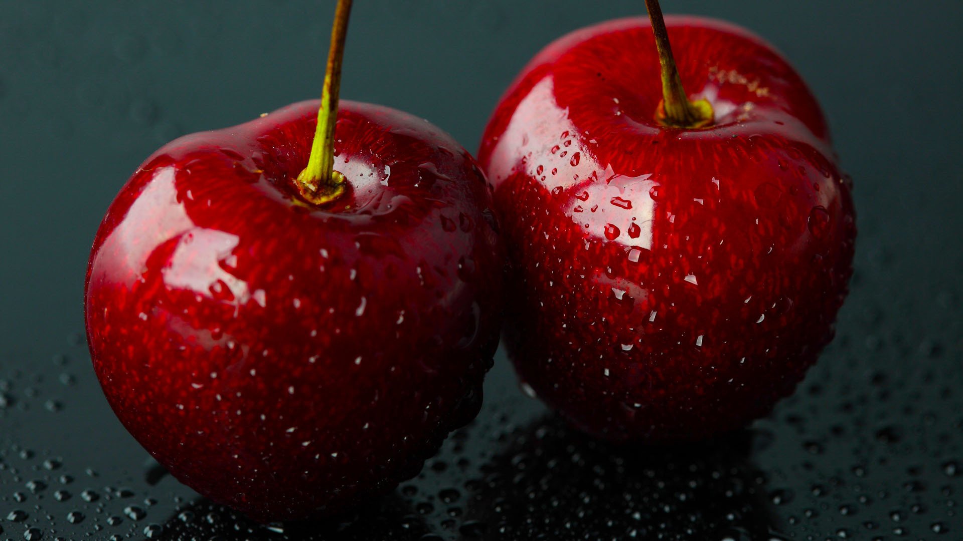 close up berries cherry drops water