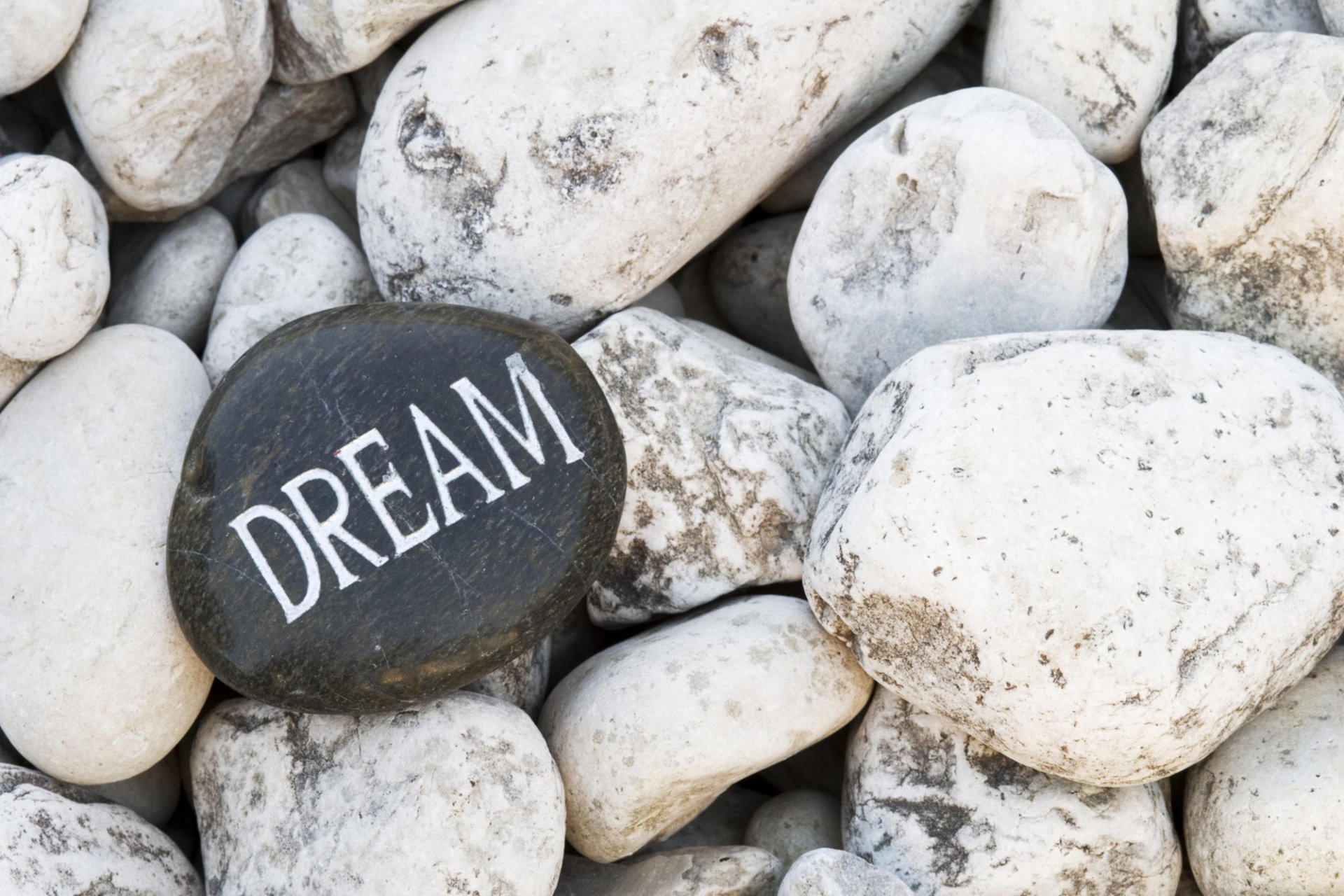 ea stones pebbles inscription close up